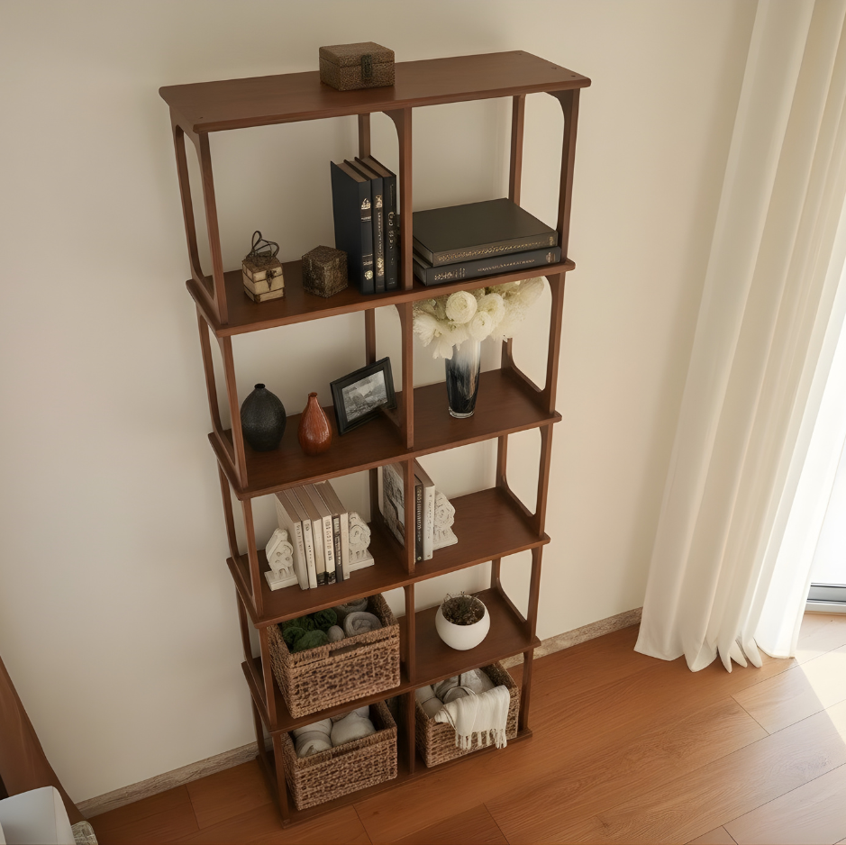 Wooden bookshelf with decorative items in a room with a sliding glass door.